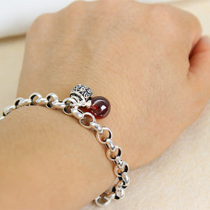 Bell Bracelet and Red Garnet