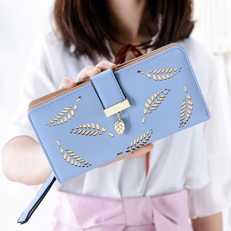 WOMEN'S WALLET WITH CUT-OUT DESIGN