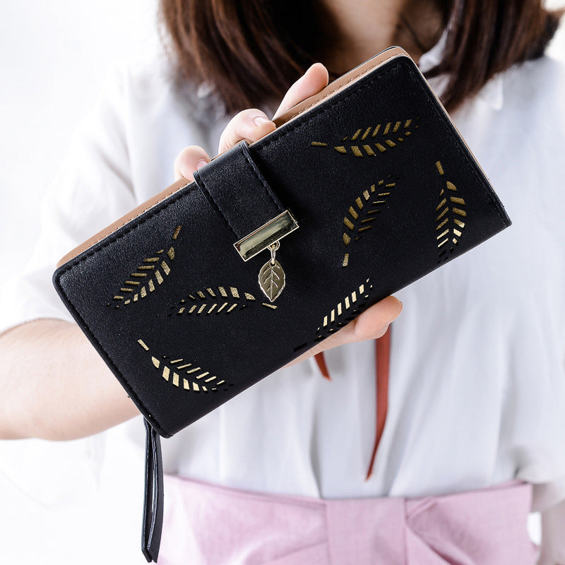 WOMEN'S WALLET WITH CUT-OUT DESIGN