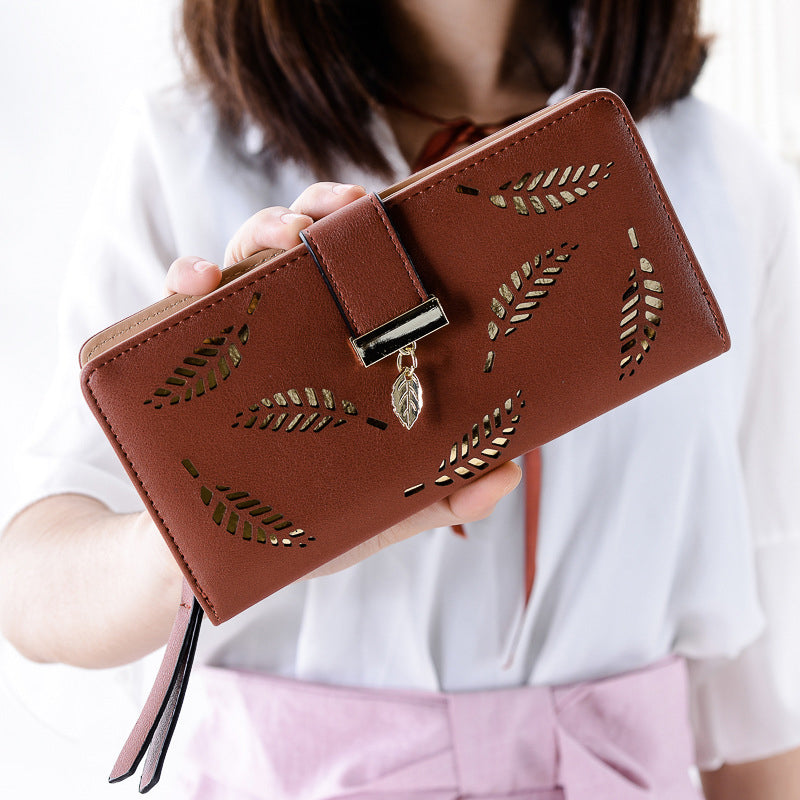 WOMEN'S WALLET WITH CUT-OUT DESIGN