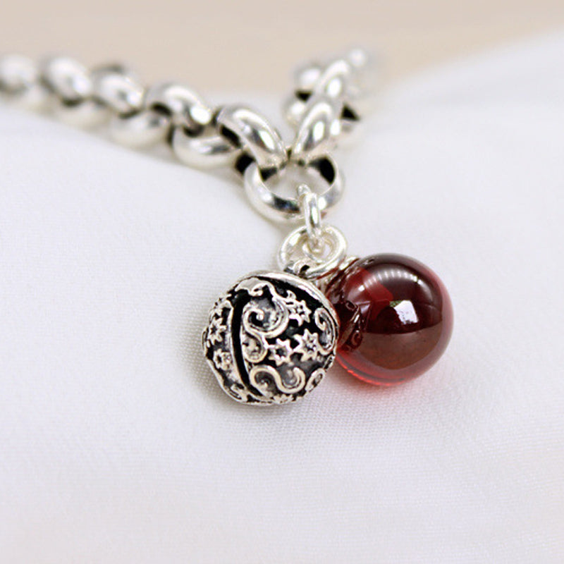 Bell Bracelet and Red Garnet